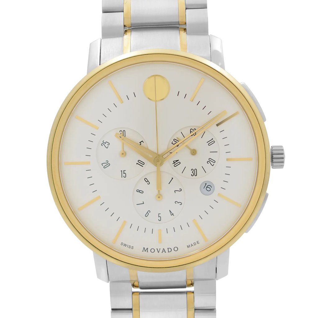 An image of a wristwatch taken from a front close-up angle, highlighting the watch face. The watch features a round, white dial with gold accents and multiple subdials. The case is bordered by a gold bezel, and the band is a combination of silver and gold links. The crown is visible on the right side of the watch face. The condition is noted as new with defects.