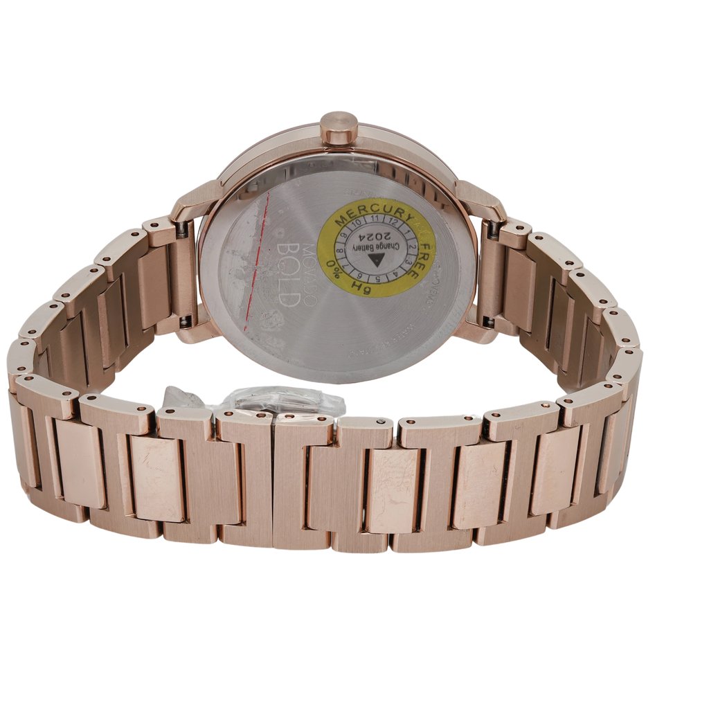 An image of a Wristwatch by Movado. This Pre Owned item is designed for Women, featuring a Casual style. It has a Quartz movement and an Analog display with a Rose Gold dial color. The indices include 12-Hour Dial,Non-Numeric Hour Marks. The band is made of Stainless Steel and the case is made of Stainless Steel. The watch has a Round shape with a case size of 34 mm and a case thickness of 8 mm.