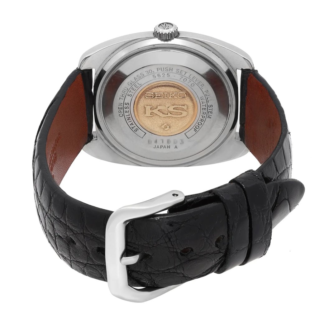 An image of a Wristwatch by Seiko. This Pre Owned item is designed for Men, featuring a Classic style. It has a Mechanical (Automatic) movement and an Analog display with a Silver dial color. The indices include 12-Hour Dial,Seconds Hand,Stick Indexes. The band is made of Leather and the case is made of Stainless Steel. The watch has a Round shape with a case size of 36 mm and a case thickness of 10 mm.