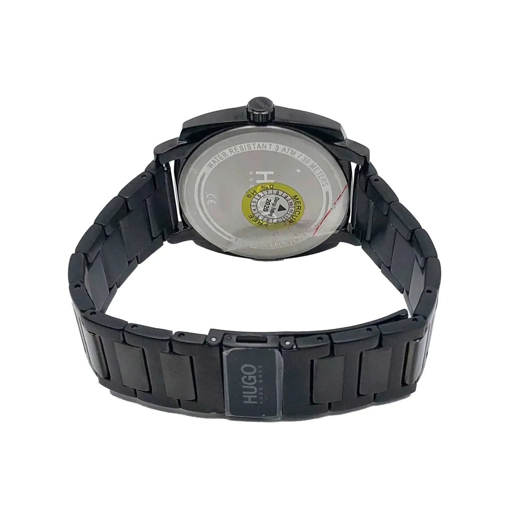 An image of a Wristwatch by HUGO BOSS. This Display Model item is designed for Men, featuring a Dress/Formal style. It has a Quartz movement and an Analog display with a Dark Green dial color. The indices include 12-Hour Dial,Stick Indexes. The band is made of Stainless Steel and the case is made of Stainless Steel. The watch has a Cushion shape with a case size of 40 mm and a case thickness of 9 mm.