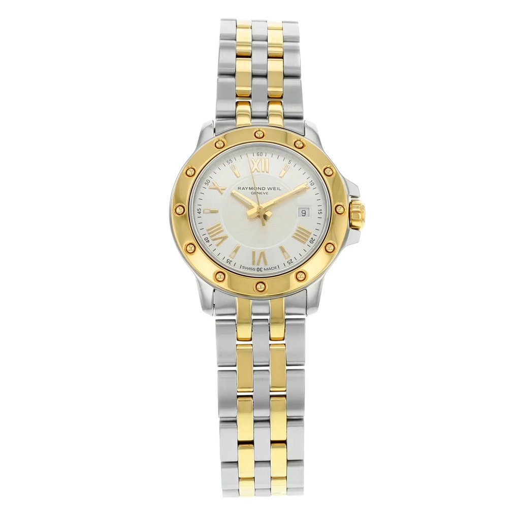 An image of a Wristwatch by RAYMOND WEIL. This Pre Owned item is designed for Women, featuring a Dress/Formal style. It has a Quartz movement and an Analog display with a Silver dial color. The indices include 12-Hour Dial,Roman Numerals,Stick Indexes. The band is made of Stainless Steel and the case is made of Stainless Steel. The watch has a Round shape with a case size of 28 mm and a case thickness of 7 mm.