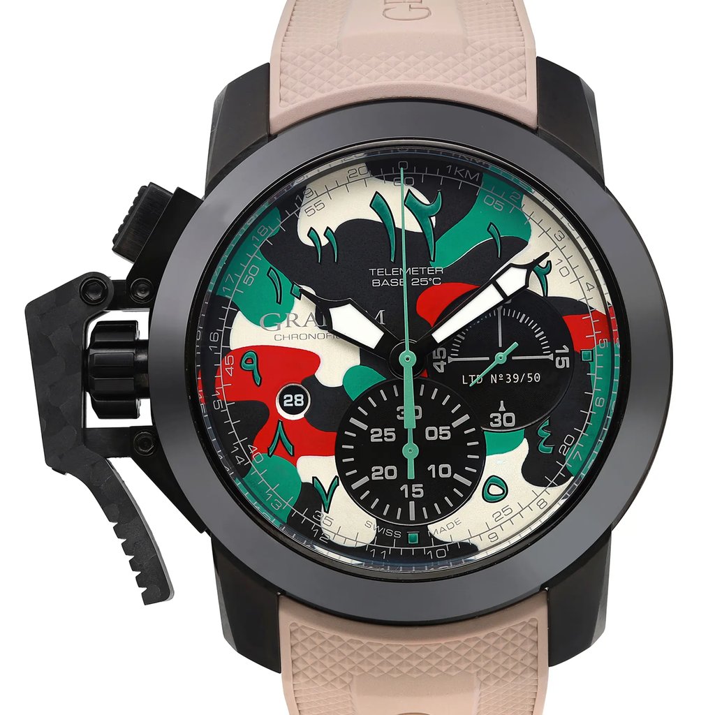 An image of an unworn Graham men's luxury wristwatch with a close-up front view of the round watch face. The dial features a multicolor camouflage pattern with a black bezel. The watch has a 12-hour dial with indices and black sub-dials. The case is made of stainless steel, and it is attached to a beige rubber/silicone band. The image is taken at a direct angle.