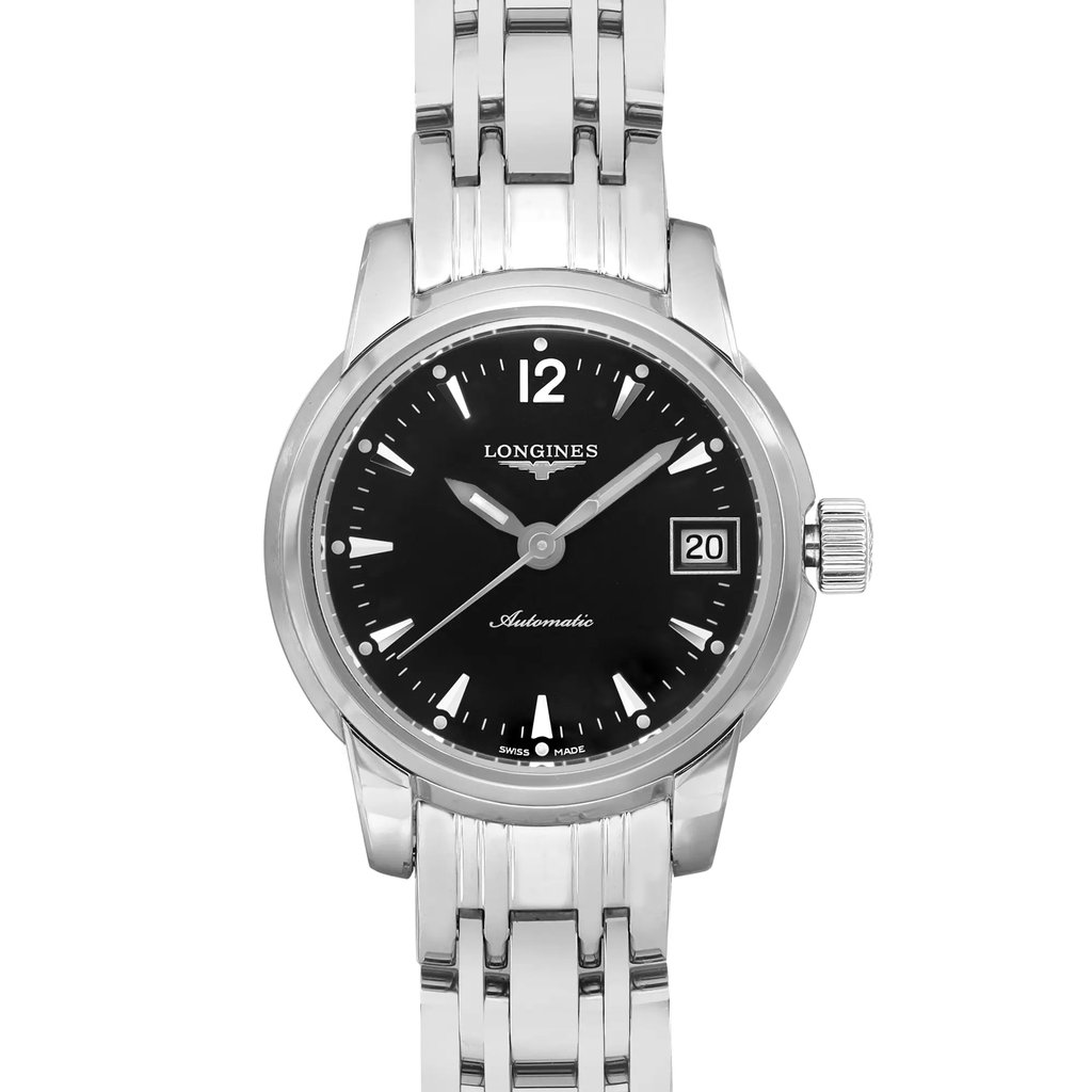 An image of a wristwatch taken from a front close-up angle, focusing on the watch face. The watch features a black dial with silver hour markers and hands. The date is displayed on the right side. The stainless steel bracelet is partially visible at the top and bottom of the image. The overall condition of the watch is pre-owned.