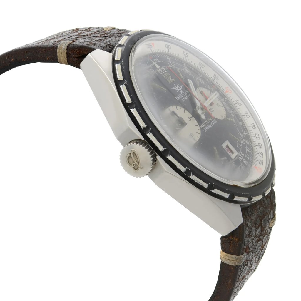 An image of a pre-owned Breitling men's wristwatch. It presents a side profile view from the angle showing the crown on the left side, showcasing the round stainless steel case and a black and white dial visible beneath a crystal. The watch has an aftermarket leather band and is positioned at a close distance against a white background. Minor scratches on the bezel can be seen.