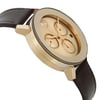 An image of a pre-owned wristwatch taken from a side profile view, opposite the crown. The watch features a gold-toned case and a brown leather strap. The angle highlights the watch's face with its three subdials and golden hands, giving a clear view of its elegant design. The photograph is shot at a moderate distance, focusing on the watch's detailed craftsmanship.