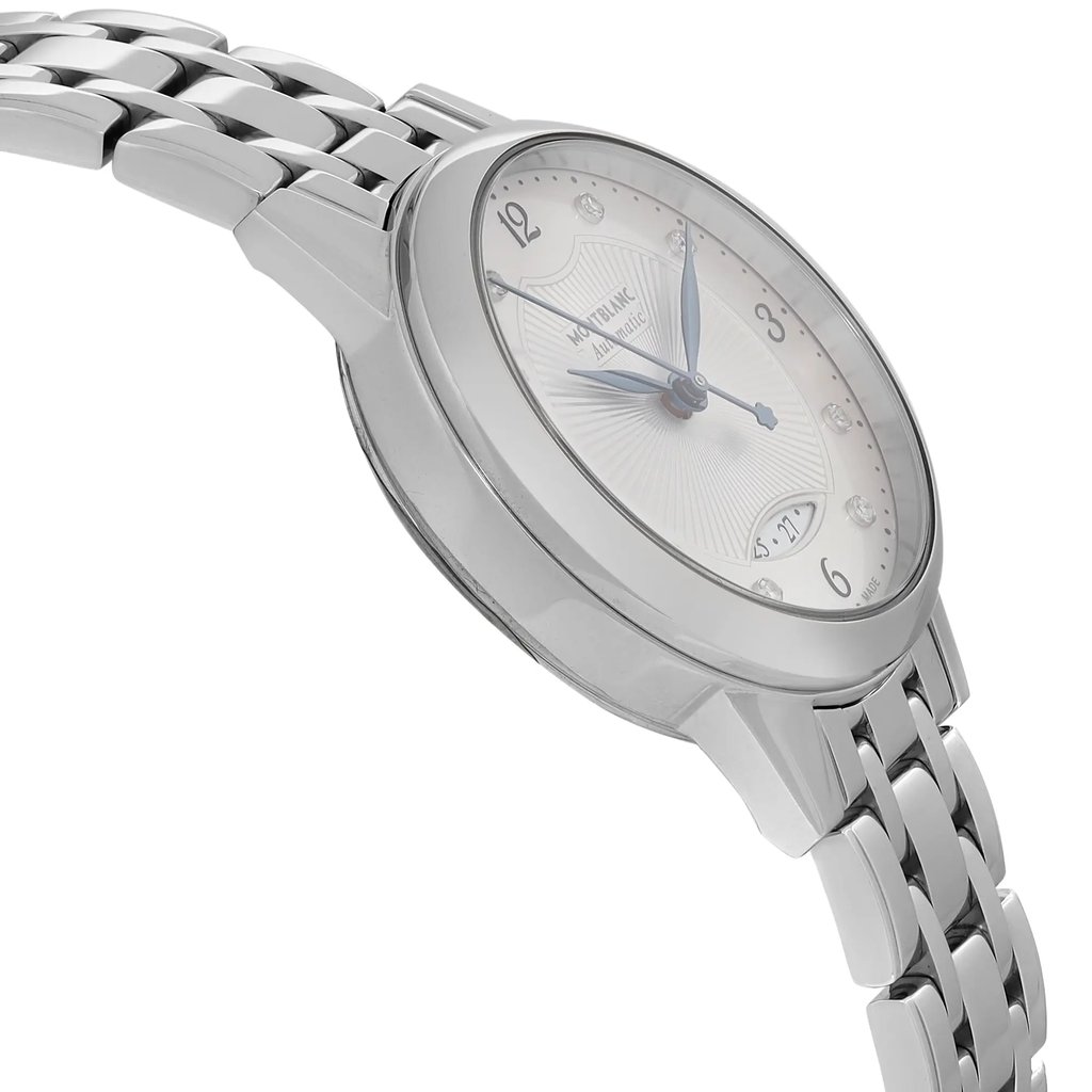 An image of a pre-owned Montblanc women's wristwatch in a side profile view opposite the crown. The watch features a round stainless steel case and band with a gray bezel. The silver guilloche dial showcases blue hands, a date indicator, and numeric hour markers at 12, 3, 6, and 9, with crystal indices at other positions. The watch is photographed at a close distance, focusing on the side angle to emphasize the watch's thickness and the link bracelet's design.