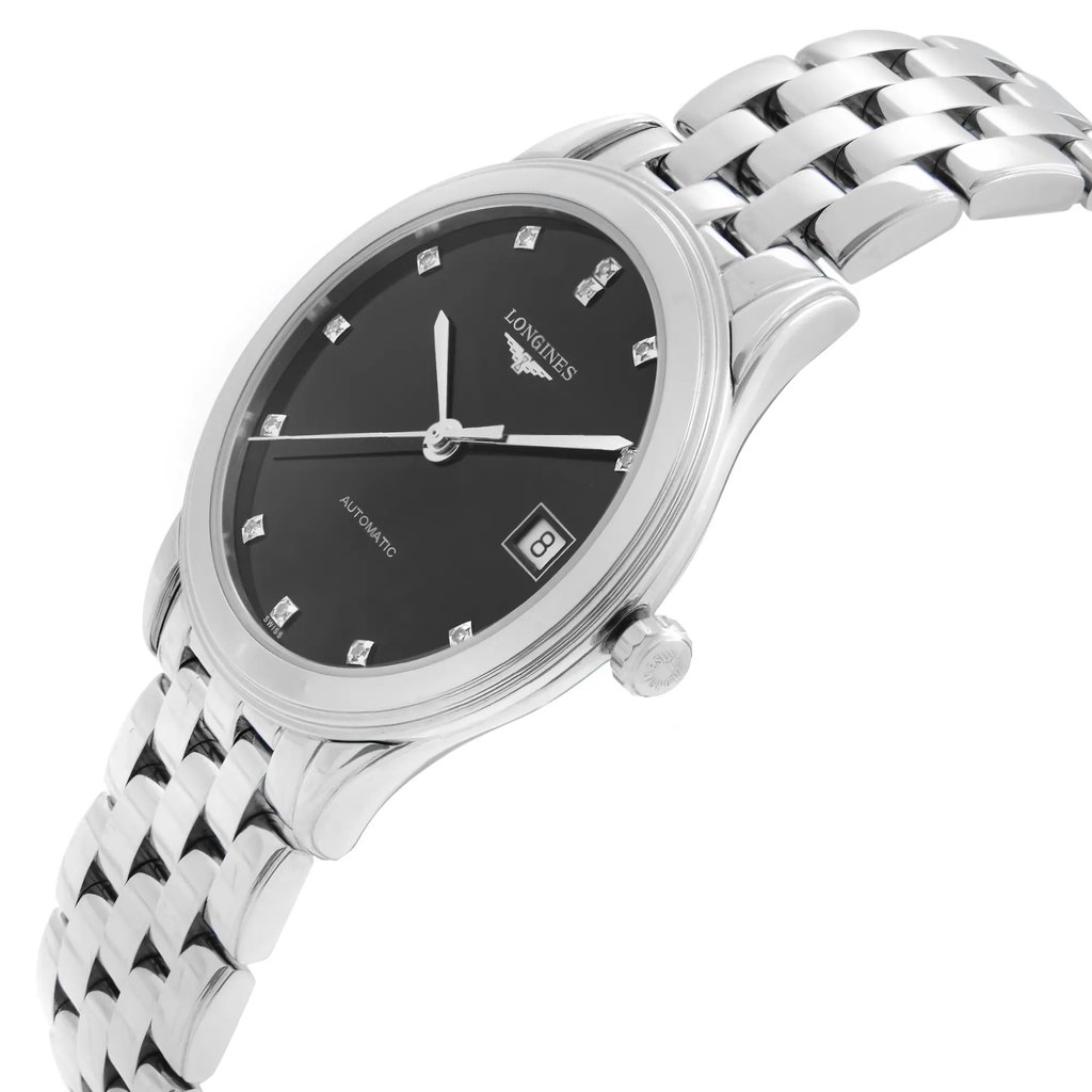 An image of a pre-owned wristwatch viewed from the side profile, showcasing the crown prominently. The watch features a silver metal bracelet and a black dial with silver hour markers. The angle highlights the watch's elegant design and the crown's placement on the right side. The image captures the watch at a close range, emphasizing its details and craftsmanship.