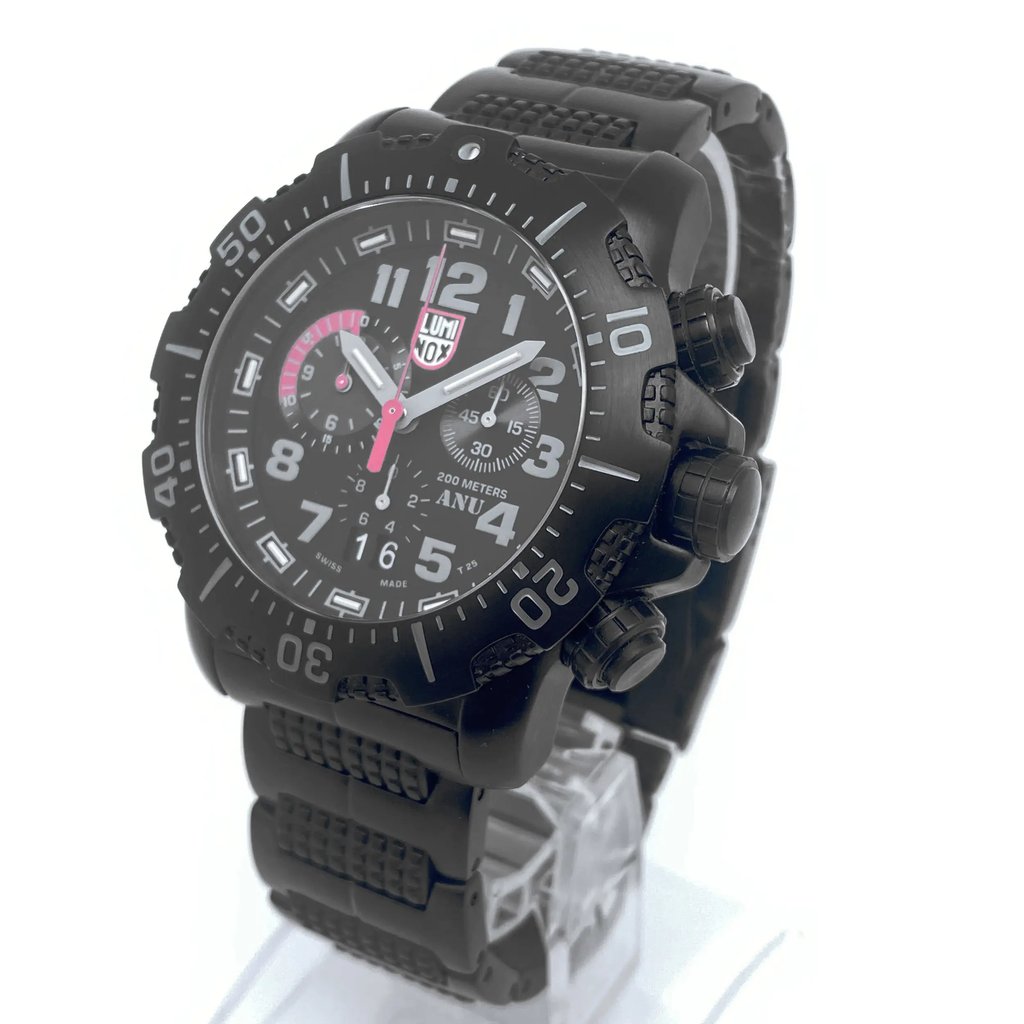An image of a Wristwatch by Luminox. This Pre Owned item is designed for Men, featuring a Diver/Military style. It has a Quartz movement and an Analog display with a Black dial color. The indices include 12-Hour Dial,Arabic Numerals,Easy to Read/Large Numerals,Multi Dial. The band is made of Stainless Steel and the case is made of Stainless Steel. The watch has a Round shape with a case size of 45 mm and a case thickness of 14 mm.