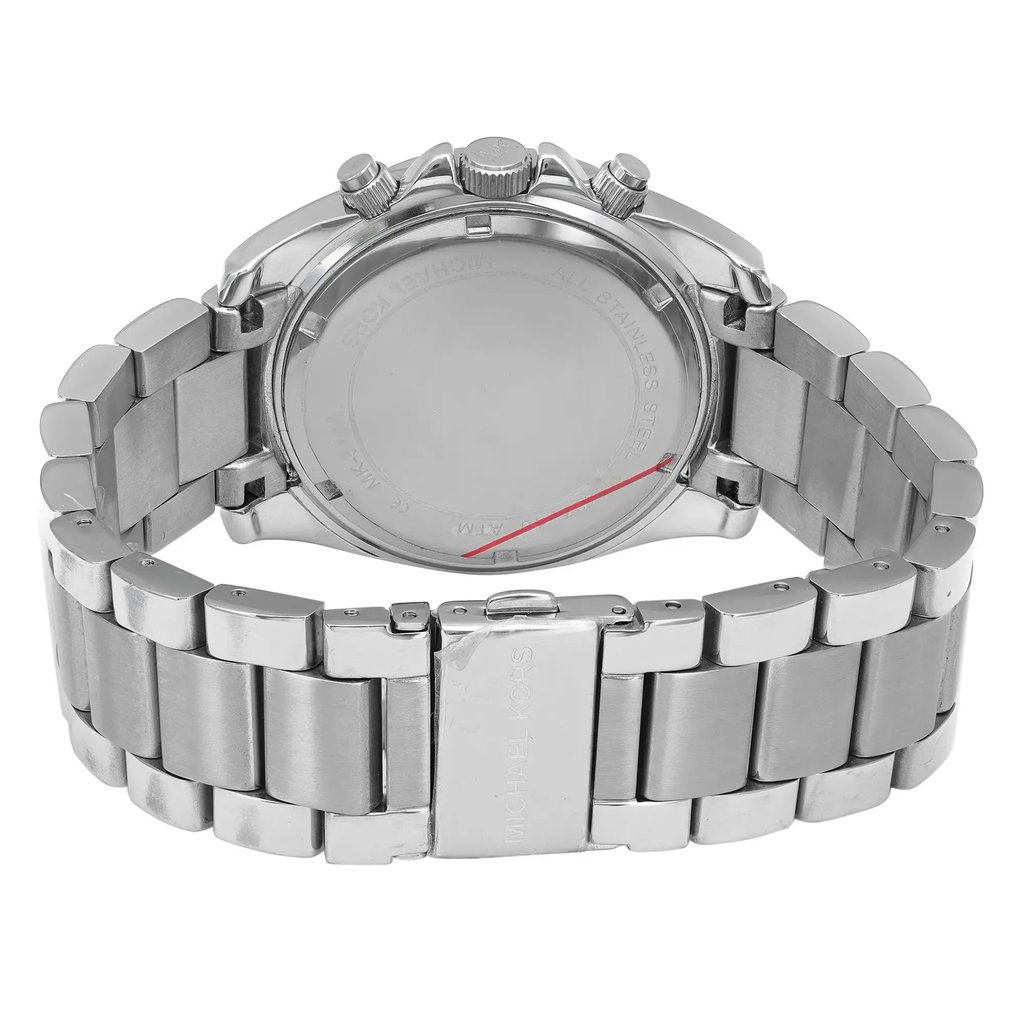 An image of a Wristwatch by Michael Kors. This Pre Owned item is designed for Women, featuring a Dress/Formal style. It has a Quartz movement and an Analog display with a Silver dial color. The indices include Arabic Numerals. The band is made of Stainless Steel and the case is made of Stainless Steel. The watch has a Round shape with a case size of 39 mm and a case thickness of 11.5 mm.