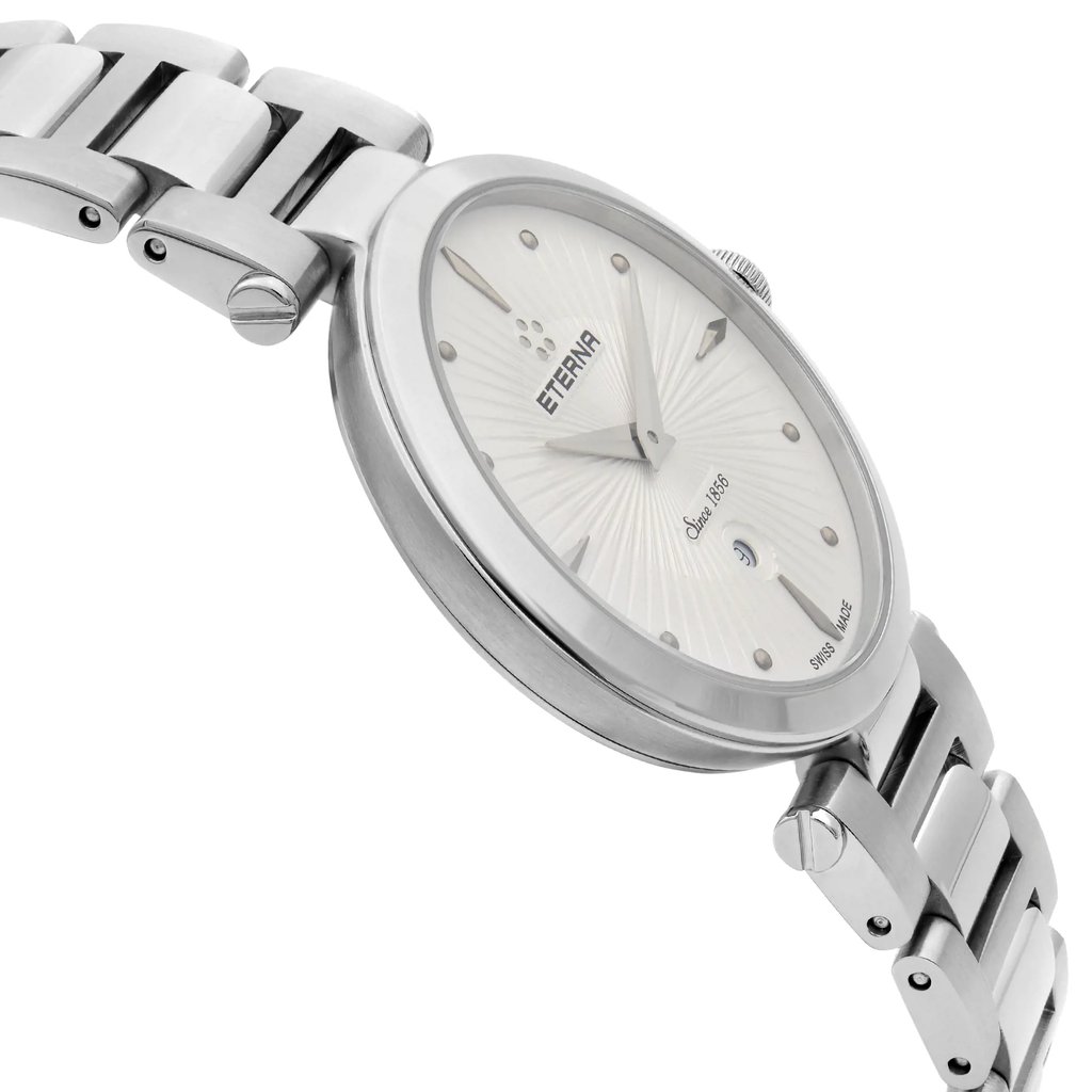 An image of a wristwatch viewed from the side profile, opposite the crown. The watch features a metallic bracelet and a sleek, round case. The angle highlights the smooth curvature of the watch's body and the intricate design of the face, showcasing its display model condition. The image is taken at a close distance, emphasizing the craftsmanship of the timepiece.
