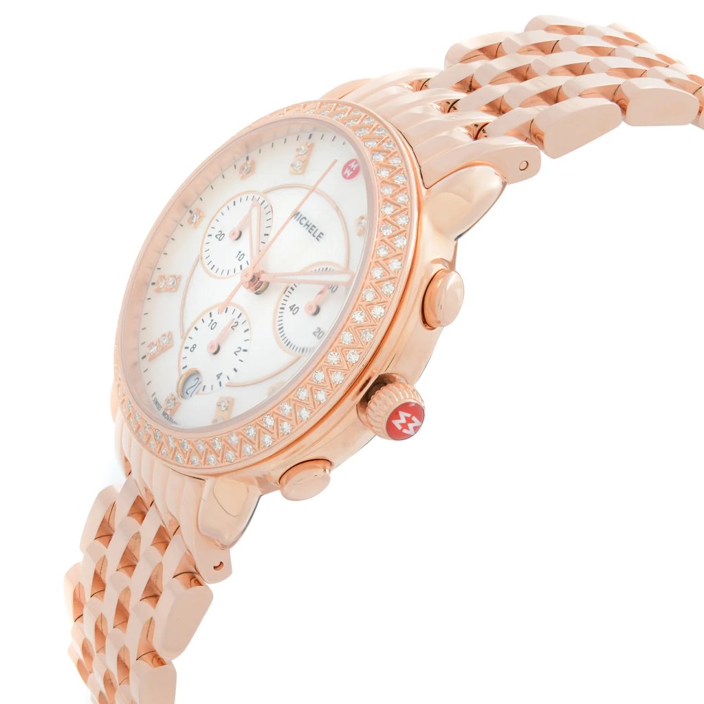 An image of a wristwatch captured from a side profile view, highlighting the crown on the right side. The watch features a round face with a textured bezel and a linked metal band, presented as a display model. The angle showcases the watch's intricate details, including its dial and sub-dials, viewed at a close distance.