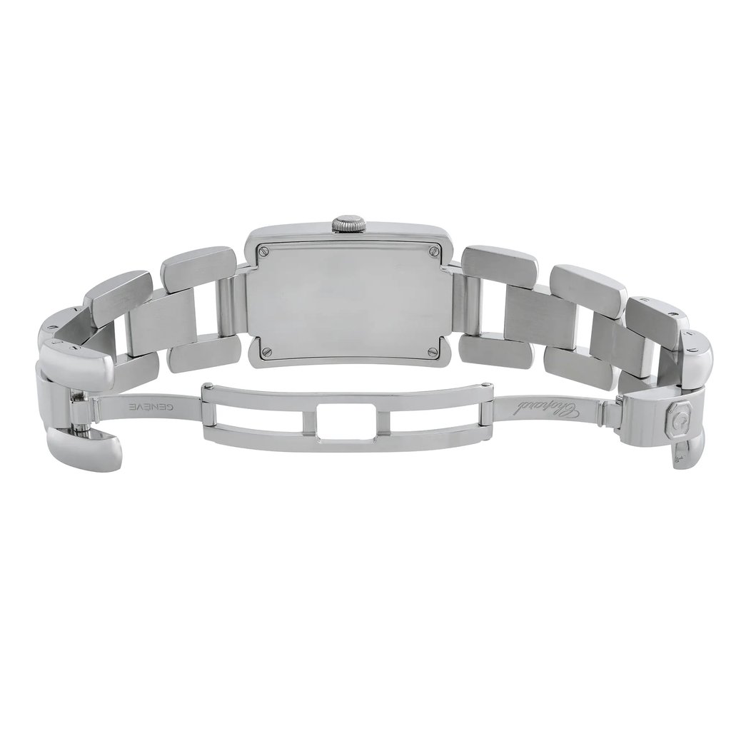 An image of a pre-owned wristwatch taken from the back view, showcasing the open clasp. The watch is positioned horizontally, with the bracelet's links and clasp clearly visible. The angle allows for a detailed look at the metal construction and design elements of the band, captured from a medium distance.