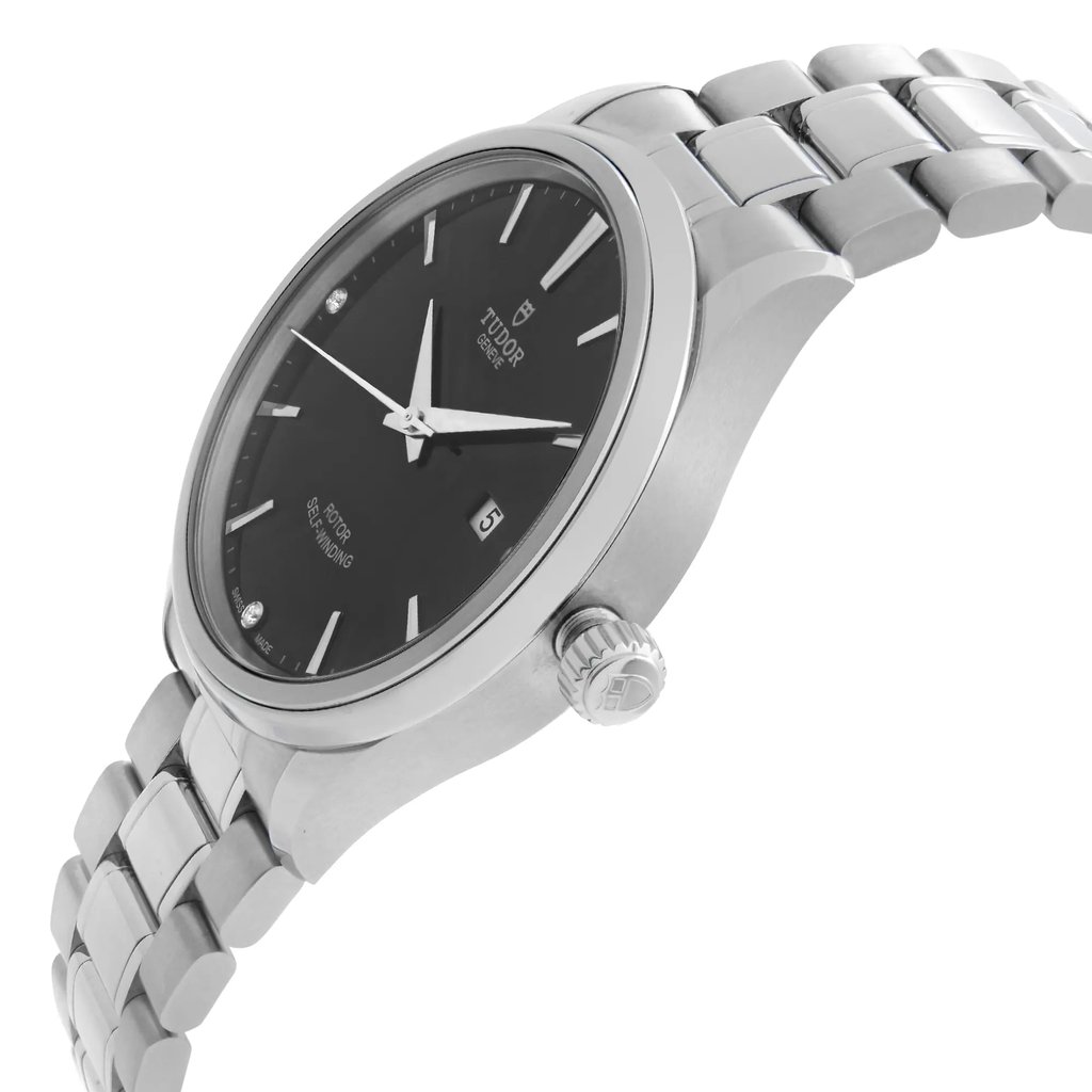An image of a Wristwatch by TUDOR. This Pre Owned item is designed for Men, featuring a Casual,Dress/Formal style. It has a Mechanical (Automatic) movement and an Analog display with a Black dial color. The indices include 12-Hour Dial,Diamond Markers,Stick Indexes. The band is made of Stainless Steel and the case is made of Stainless Steel. The watch has a Round shape with a case size of 41 mm and a case thickness of 10.5 mm.