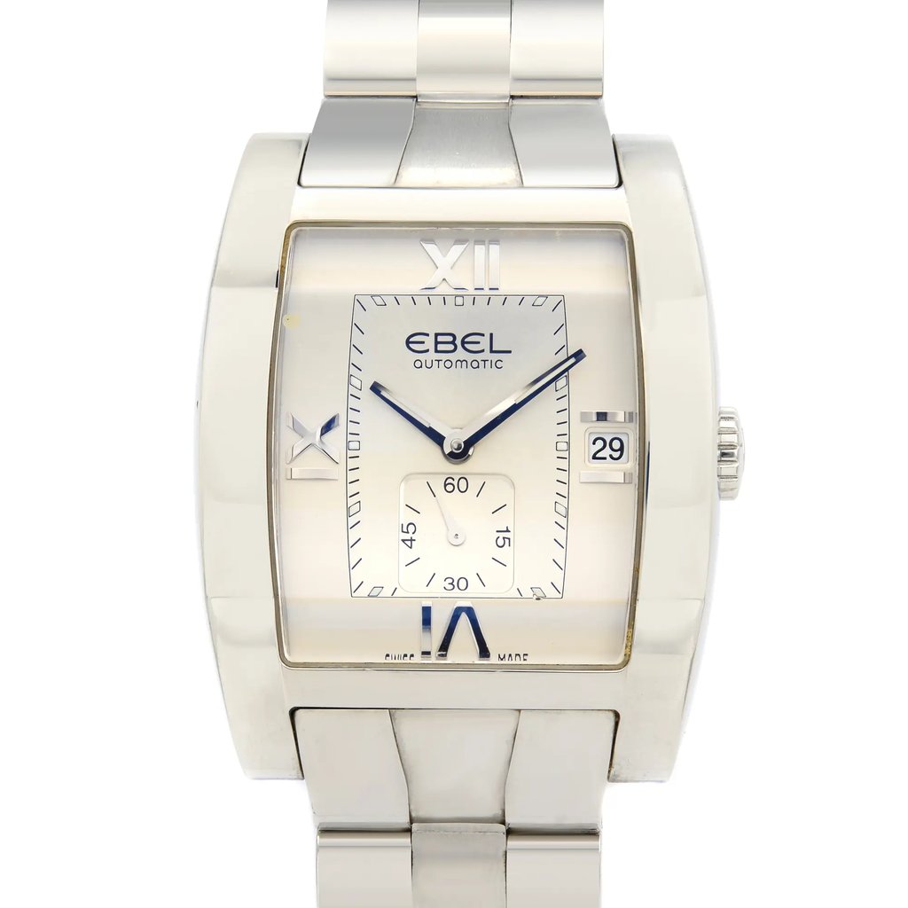 An image of a pre-owned wristwatch, captured in a front close-up shot. The watch face is prominently displayed, showcasing its rectangular shape and silver-toned design. Roman numerals are positioned at the 12 and 6 o'clock marks, with a date window at 3 o'clock. The brand name "Ebel" and "Automatic" are printed on the dial. The watch features a metallic strap, with its polished links partially visible at the top and bottom edges of the image.