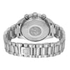 An image of a pre-owned wristwatch showing the back view and closed clasp. The watch is positioned centrally, with a focus on the metal bracelet and the engraved design on the case back. The angle slightly tilts downward, capturing the watch from a close distance to highlight the details of the clasp and links.