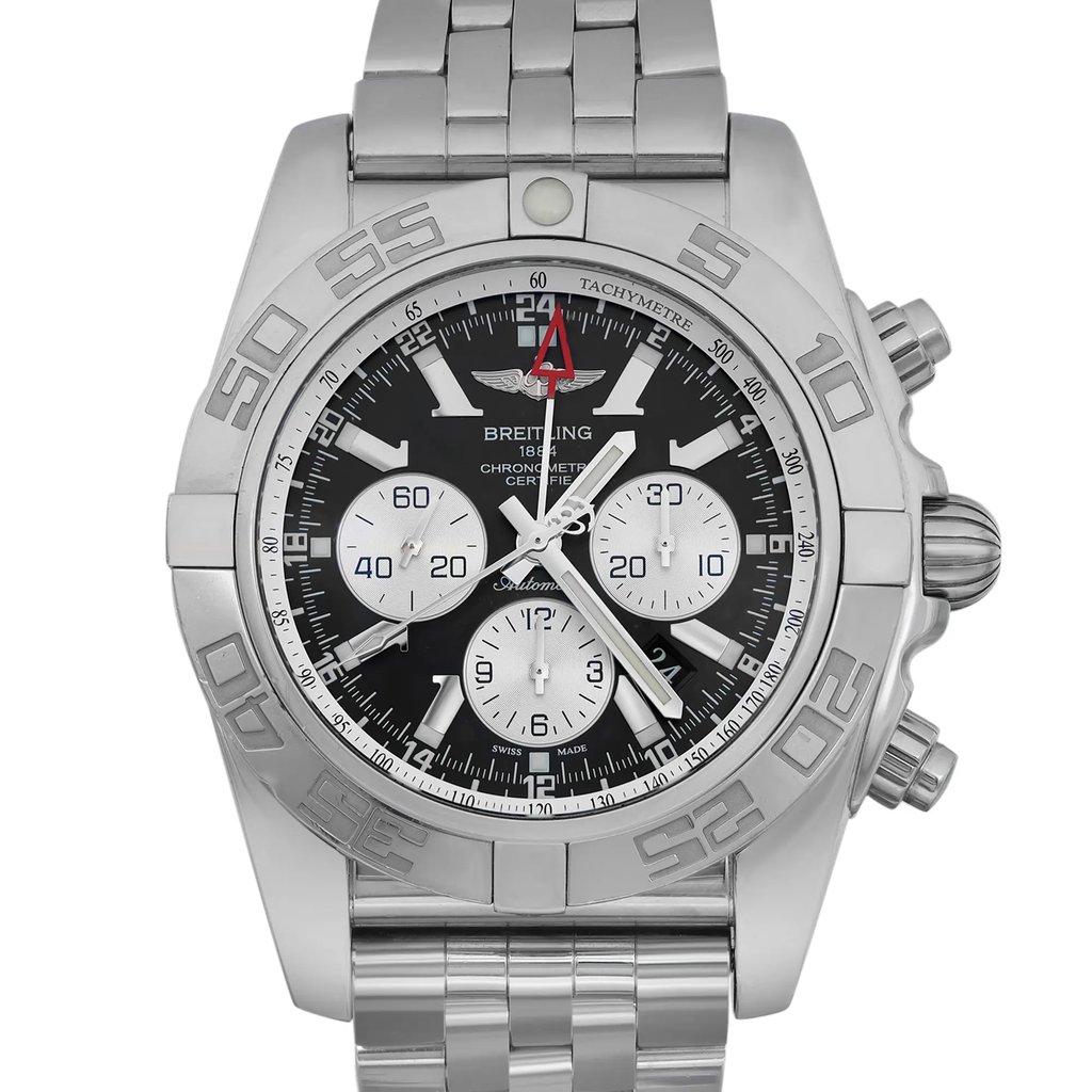 An image of a pre-owned Breitling men's luxury wristwatch with a close-up front view of the round black dial and gray bezel. The watch, positioned centrally and facing directly forward, shows a 12-hour dial with stick indexes, small seconds subdial, date indicator, luminous hands, and GMT feature. The stainless steel band and case have light signs of wear. The photograph is taken from a close distance, capturing the intricate details of the watch face and part of the band.
