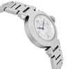 An image of a pre-owned women's Cartier wristwatch viewed from a three-quarter angle. The watch is positioned to show its left side and part of the face, highlighting the silver-toned case and bracelet. The dial features Arabic numerals at the 12, 3, 6, and 9 o'clock positions, with blue hands set against a white background. The image is taken at close range, focusing on the watch's elegant design and craftsmanship.