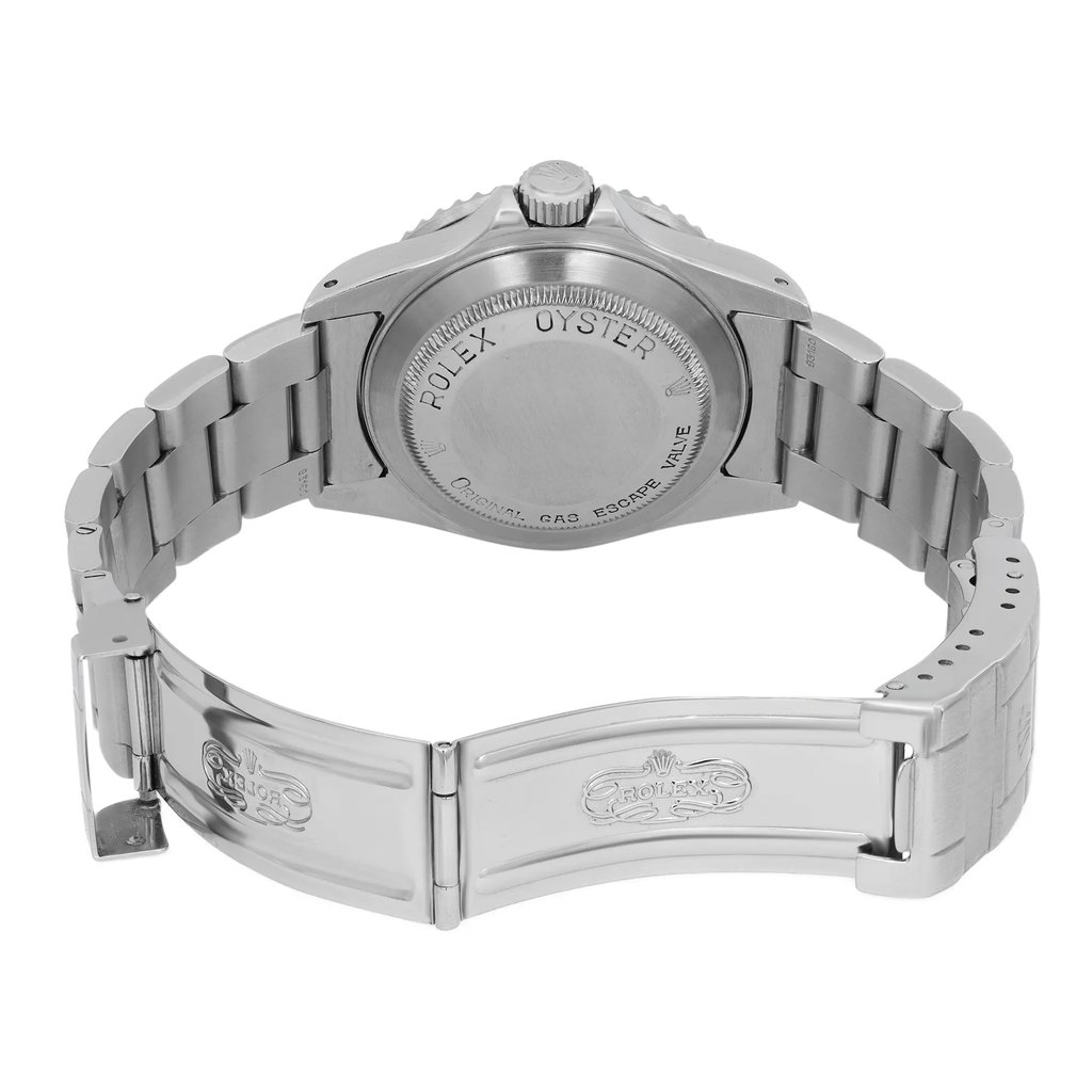 An image of a pre-owned men's Rolex wristwatch viewed from the back, showcasing its solid stainless steel caseback and open double-locking fold-over clasp. The watch is positioned horizontally, with the band partially unfolded, revealing the stainless steel construction. The angle provides a clear view of the engraved markings on the caseback and clasp, highlighting its round shape and robust design.