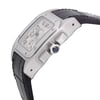 An image of a pre-owned Cartier luxury wristwatch, showcased in a close-up side profile view where the crown is clearly visible. The watch has a square stainless steel case with a steel bezel and a silver dial featuring Roman numerals, a chronograph, a date indicator, luminous hands, and a small seconds subdial. The watch is fitted with a black leather band and the crown is adorned with a blue stone, positioned on the right side of the case as viewed from this angle.