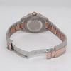 Back View Of Solid Back Case And Open Stainless Steel,Rose Gold Band Of Rolex 126711CHNR Watch Pre Owned Condition