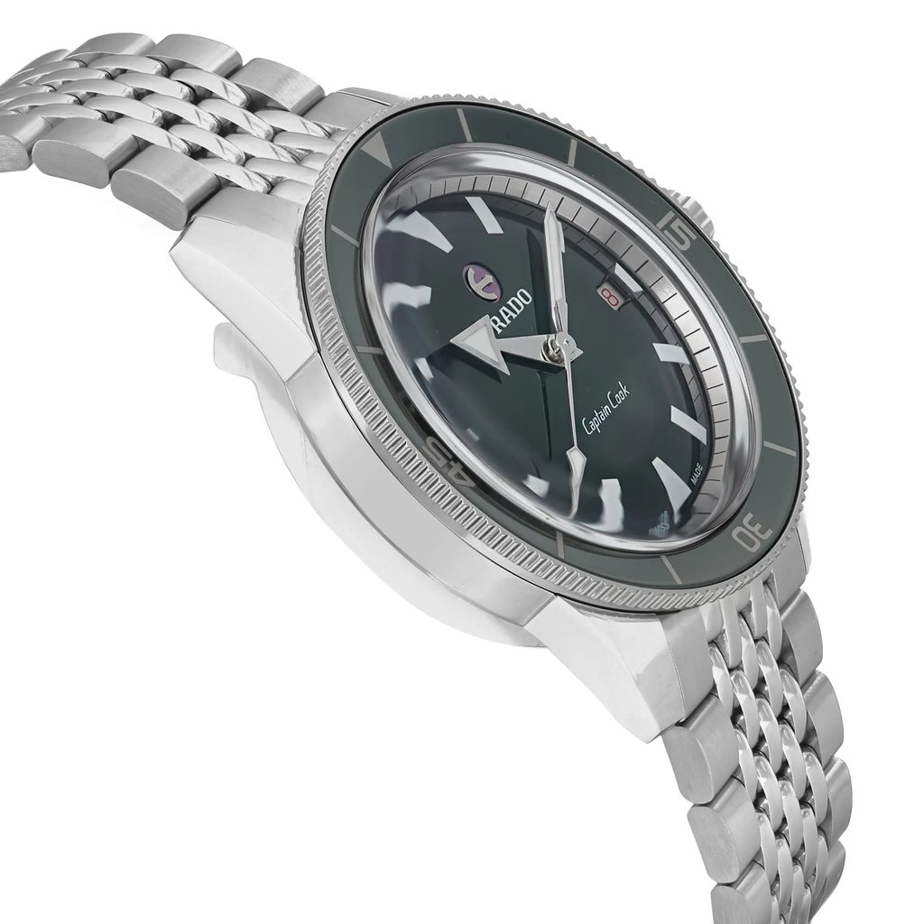 An image of a Wristwatch by Rado. This Unworn item is designed for Men, featuring a Casual style. It has a Mechanical (Automatic) movement and an Analog display with a Green dial color. The indices include 12-Hour Dial,Stick Indexes. The band is made of Stainless Steel and the case is made of Stainless Steel. The watch has a Round shape with a case size of 40 mm and a case thickness of 13 mm.