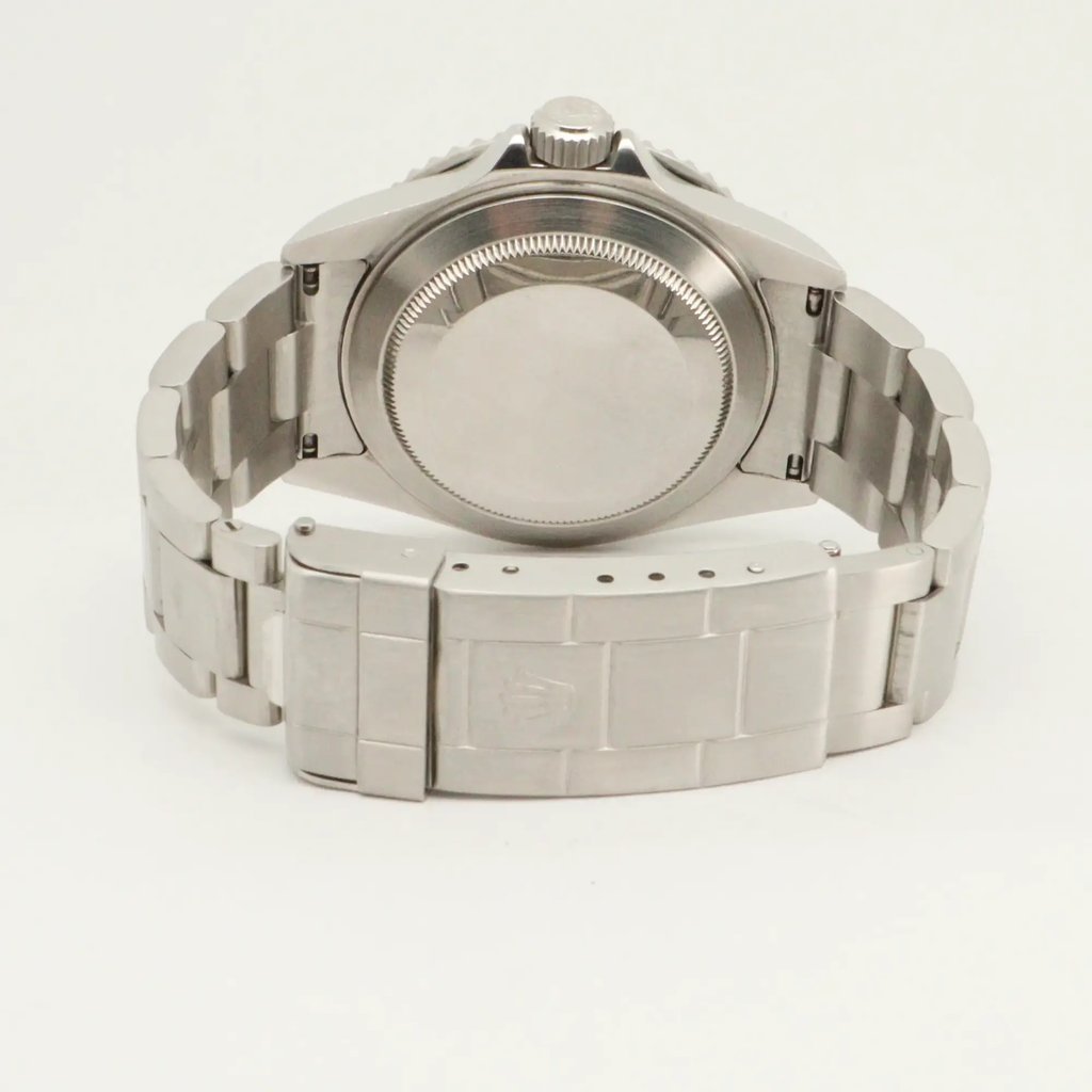 Back View Of Screwback Back Case And Closed Stainless Steel Band Of Rolex 16610V Watch Pre Owned Condition