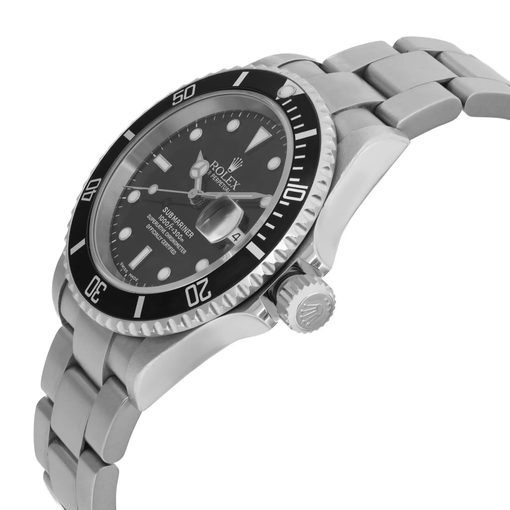 An image of a pre-owned wristwatch displayed in a side profile view, with the crown prominently visible. The watch features a stainless steel bracelet and a black dial with a unidirectional bezel. The angle captures the watch at a moderate distance, highlighting its sleek design and craftsmanship.