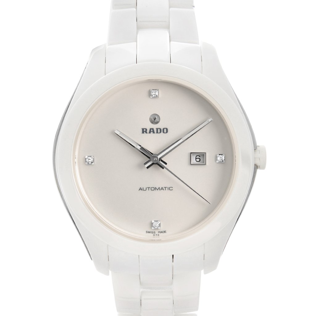 An image of a wristwatch taken from a front close-up angle, focusing on the watch face. The watch is a display model with a sleek design. The face features a minimalistic layout with hour markers, a date window, and three hands. The watch case and bracelet have a polished finish, highlighting its elegant appearance.