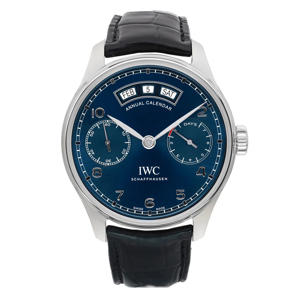 An image of a pre-owned wristwatch captured from a front full-frontal view. The watch features a dark blue dial with multiple sub-dials and an annual calendar display. It has a silver case and a black leather strap, positioned centrally and photographed at eye level, showcasing its design details clearly.