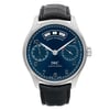 An image of a pre-owned wristwatch captured from a front full-frontal view. The watch features a dark blue dial with multiple sub-dials and an annual calendar display. It has a silver case and a black leather strap, positioned centrally and photographed at eye level, showcasing its design details clearly.