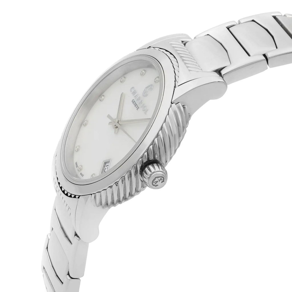 An image of a pre-owned wristwatch captured from a side profile view, showcasing the crown prominently. The watch features a metallic band and a textured bezel. The angle highlights the watch face and its details, including the dial and markers, from a close distance, focusing on the craftsmanship and design elements.