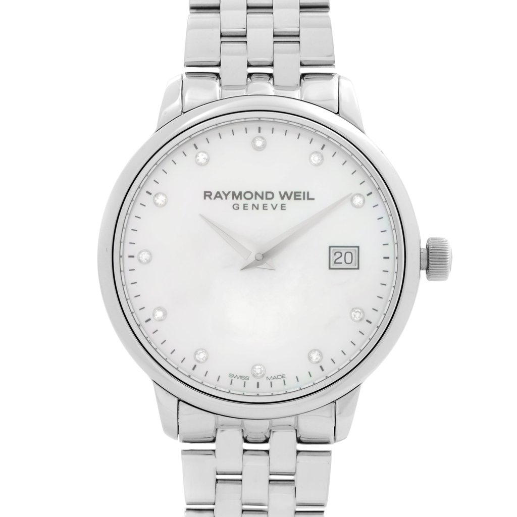 An image of a new, unworn RAYMOND WEIL women's wristwatch in a dress/formal style, presented in a front close-up view emphasizing the watch face. The watch has a round stainless steel case and a matching stainless steel band. The dial is white mother of pearl with the RAYMOND WEIL logo and 'GENEVE' written just below the center, with diamond hour markers and a date window at the 3 o'clock position. The image is taken from a short distance, allowing clear visibility of the watch's details.