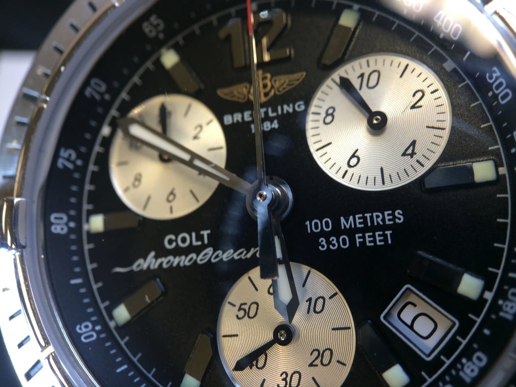 Up Close Front Facing Picture Of Breitling Colt Ocean Stainless Steel Watch Pre Owned Condition