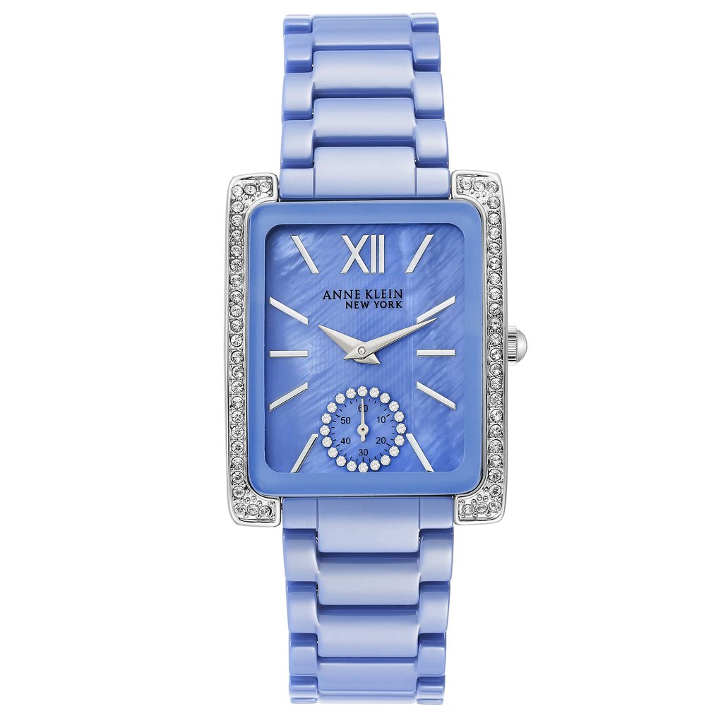 An image of a Wristwatch by Anne Klein. This Display Model item is designed for Women, featuring a Casual,Dress/Formal style. It has a Quartz movement and an Analog display with a Blue dial color. The indices include 12-Hour Dial,Stick Indexes. The band is made of Ceramic and the case is made of Stainless Steel. The watch has a Rectangle shape with a case size of 28 mm and a case thickness of 10 mm.