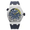 An image of a pre-owned wristwatch taken from a front full frontal view. The watch features a blue dial with yellow accents and a black rubber strap. The bezel is octagonal with visible screws, and the crown is positioned on the right side. The image is captured at close range, highlighting the watch's intricate design details.