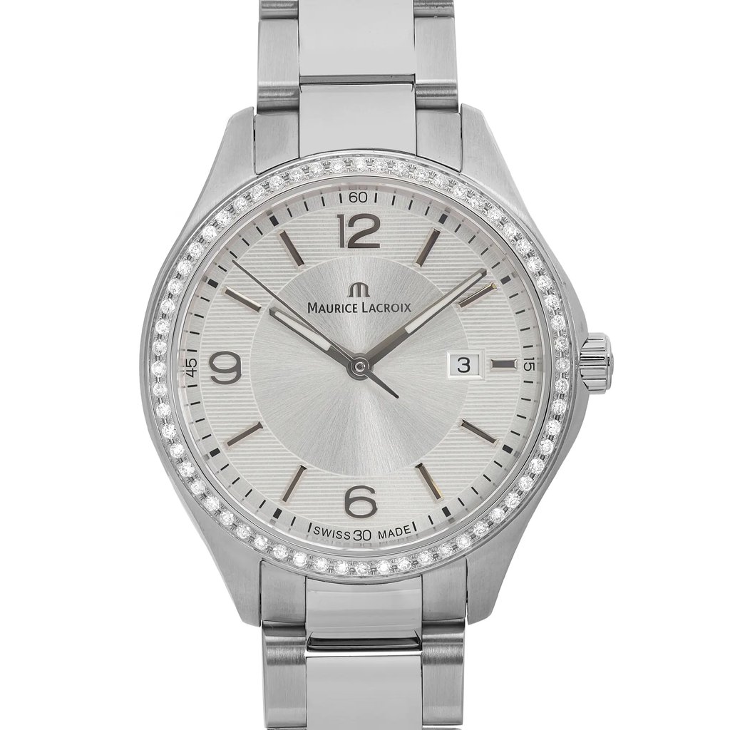 An image of a Wristwatch by Maurice Lacroix. This Unworn item is designed for Women, featuring a Luxury style. It has a Quartz movement and an Analog display with a Silver dial color. The indices include 12-Hour Dial,Arabic Numerals,Stick Indexes. The band is made of Stainless Steel and the case is made of Stainless Steel. The watch has a Round shape with a case size of 32 mm and a case thickness of 8 mm.