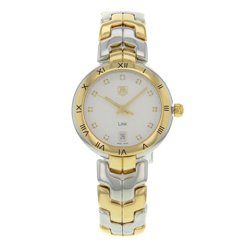 An image of a Wristwatch by TAG Heuer. This Pre Owned item is designed for Women, featuring a Luxury style. It has a Quartz movement and an Analog display with a Silver dial color. The indices include 12-Hour Dial,Diamonds. The band is made of Stainless and Solid Gold and the case is made of Stainless Steel. The watch has a Round shape with a case size of 34 mm and a case thickness of 9 mm.