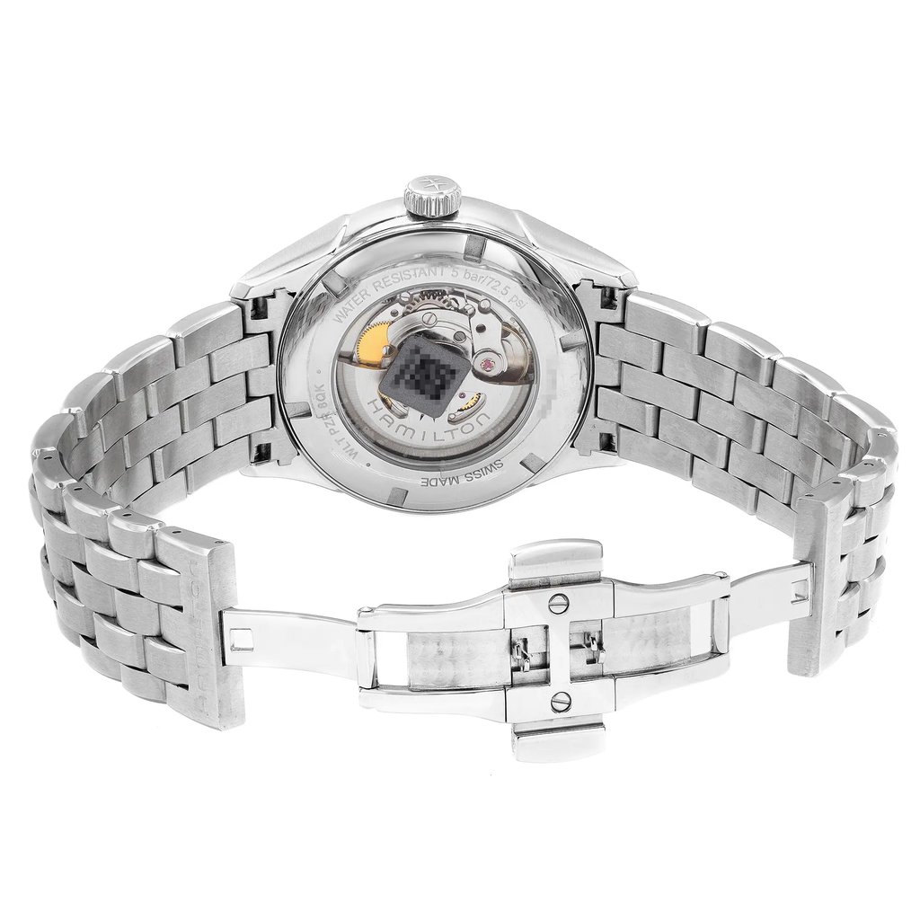 An image of a Wristwatch by Hamilton. This Pre Owned item is designed for Men, featuring a Casual style. It has a Mechanical (Automatic) movement and an Analog display with a Beige dial color. The indices include 12-Hour Dial,Non-Numeric Hour Marks,Stick Indexes. The band is made of Stainless Steel and the case is made of Stainless Steel. The watch has a Round shape with a case size of 42 mm and a case thickness of 13 mm.