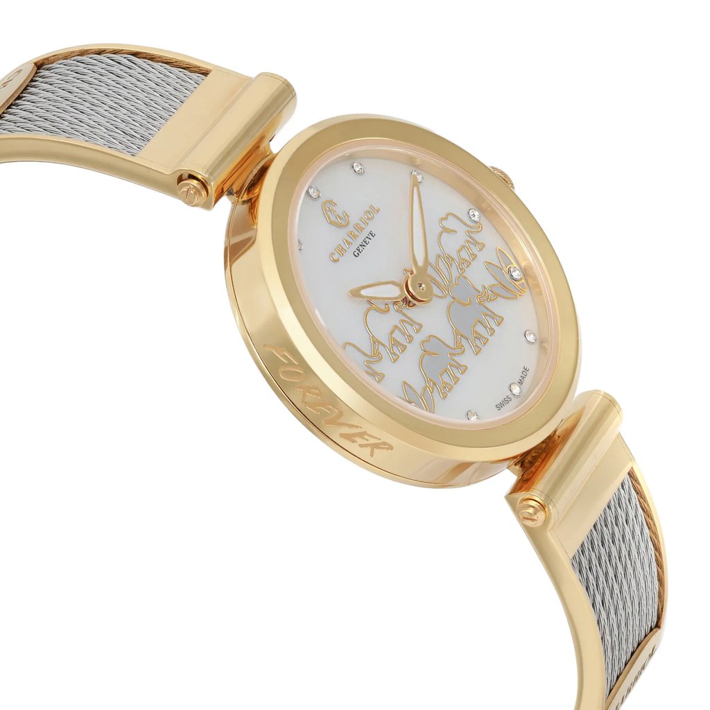 An image of a pre-owned Charriol women's wristwatch, photographed at a slight angle from the side. The watch features a gold-toned bezel engraved with the word "FOREVER," and a white dial with luminous hands and decorative elements. The bracelet is a combination of gold and silver tones. The watch is positioned to emphasize its elegant design and details.