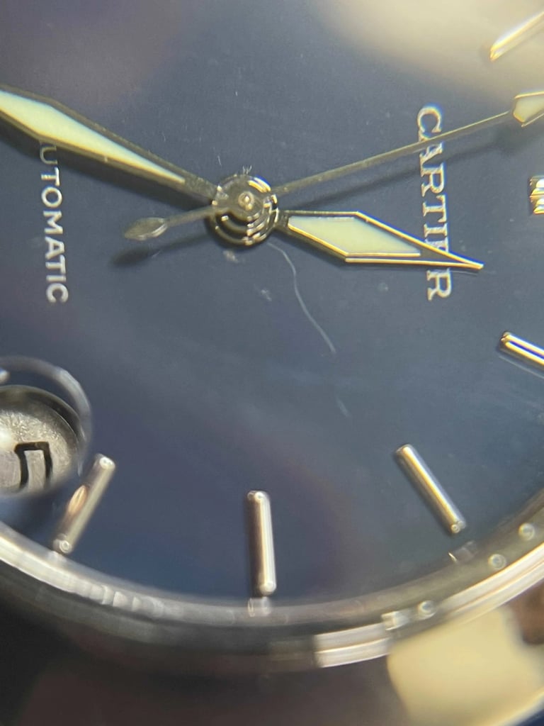 Up Close Front Facing Picture Of Cartier W31014M7 Stainless Steel Watch Pre Owned Condition