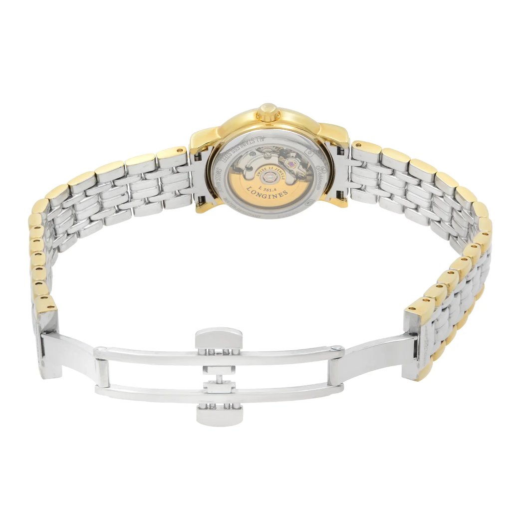 An image of a wristwatch viewed from the back, showcasing an open clasp. The watch features a two-tone metal link bracelet with silver and gold accents. The back case reveals the watch's internal mechanisms and is inscribed with branding details. The image is taken at a slight angle from above, focusing on the open clasp and back of the watch, with a moderate distance to capture the full bracelet spread.