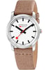 An image of a Wristwatch by Mondaine. This New With Defects item is designed for Women, featuring a Casual style. It has a Quartz movement and an Analog display with a White dial color. The indices include 12-Hour Dial,Non-Numeric Hour Marks,Stick Indexes. The band is made of Leather and the case is made of Stainless Steel. The watch has a Round shape with a case size of 36 mm and a case thickness of 6 mm.