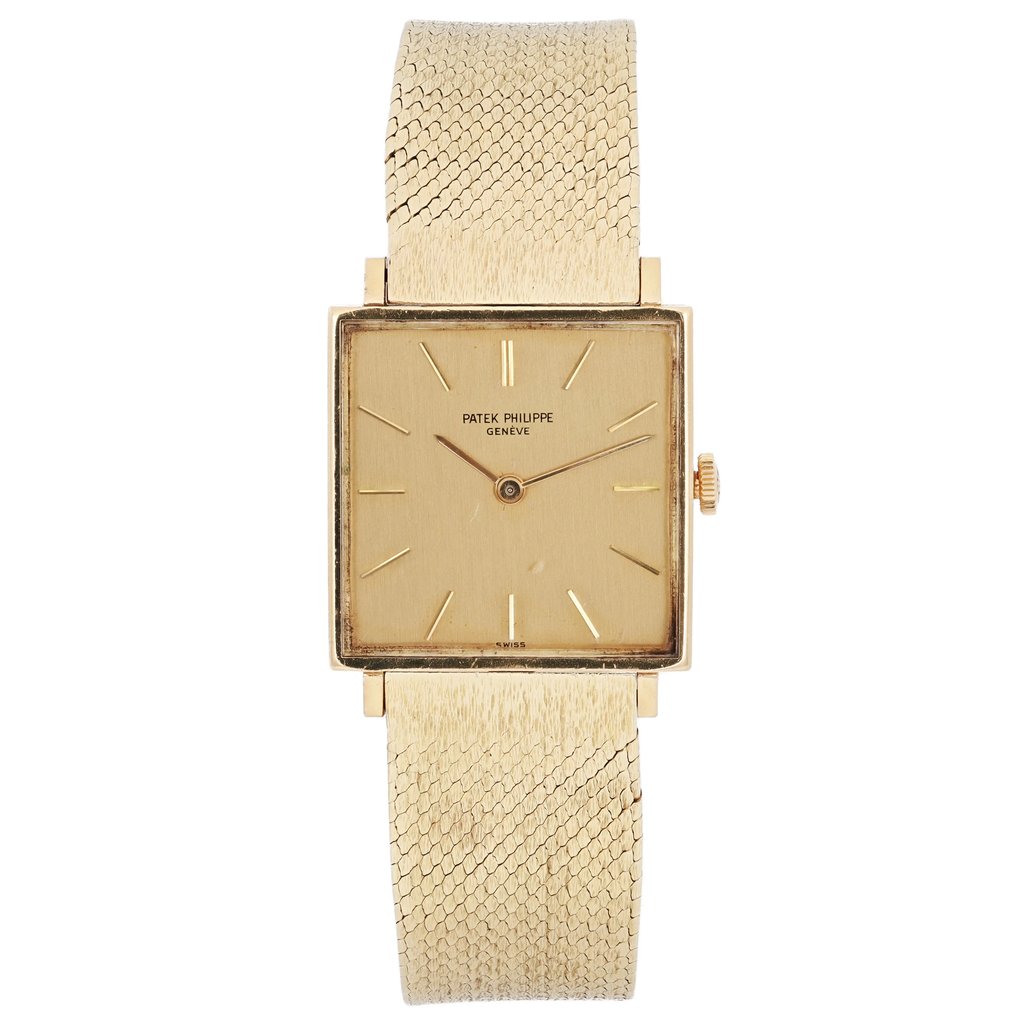 An image of a pre-owned unisex Vintage Patek Philippe Gondolo 18K Yellow Gold Dial Hand Wind Watch 3430, positioned upright and viewed directly from the front. The watch features a square gold face with minimalist hour markers and a textured yellow gold band. The image is taken at a close distance, showcasing the intricate details of the watch's design.