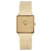 An image of a pre-owned unisex Vintage Patek Philippe Gondolo 18K Yellow Gold Dial Hand Wind Watch 3430, positioned upright and viewed directly from the front. The watch features a square gold face with minimalist hour markers and a textured yellow gold band. The image is taken at a close distance, showcasing the intricate details of the watch's design.