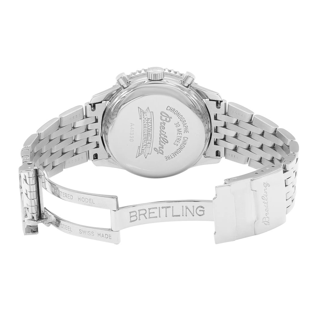 An image of a pre-owned Breitling men's wristwatch, displayed with the back view facing up. The watch features a solid stainless steel caseback and a stainless steel band. The round shape of the case is visible with a fold-over clasp that includes a flip lock safety, shown in an open position. The clasp is engraved with the Breitling logo. The watch is positioned centrally against a white background, with the band extending to the left and right, partially revealing the chronograph, date indicator, and small seconds subdial features as described in the text, although not visible in this view. The angle is a direct overhead shot, and the distance is such that the watch occupies most of the frame, providing a clear and detailed view of its design and condition.