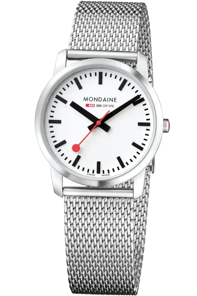 An image of a Wristwatch by Mondaine. This Display Model item is designed for Unisex Adult, featuring a Casual style. It has a Quartz movement and an Analog display with a White dial color. The indices include 12-Hour Dial,Stick Indexes. The band is made of Stainless Steel and the case is made of Stainless Steel. The watch has a Round shape with a case size of 36 mm and a case thickness of 6 mm.
