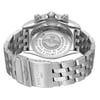 An image of a pre-owned Breitling men's wristwatch in a back view orientation. The watch is presented at a slight angle, showcasing the solid caseback made of stainless steel with engraved brand details. The round watch shape is visible and the stainless steel band leads to a fold-over clasp with flip lock safety, partially open, in the foreground. The perspective is a close-up, emphasizing the watch's closure mechanism and the quality of the materials.