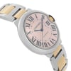 An image of a pre-owned wristwatch captured from a side profile view opposite the crown. The watch features a two-tone metal bracelet with alternating silver and gold links. The dial is adorned with Roman numerals and blue hands, enclosed in a round case. The angle highlights the curvature of the watch face and the sleek design of the bracelet, captured at a close distance.