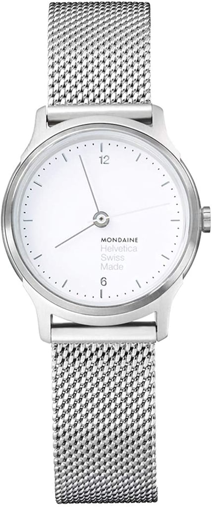 An image of a Wristwatch by Mondaine. This Display Model item is designed for Women, featuring a Classic,Dress/Formal style. It has a Quartz movement and an Analog display with a White dial color. The indices include 12-Hour Dial,Arabic Numerals,Stick Indexes. The band is made of Stainless Steel and the case is made of Stainless Steel. The watch has a Round shape with a case size of 26 mm and a case thickness of 6.5 mm.
