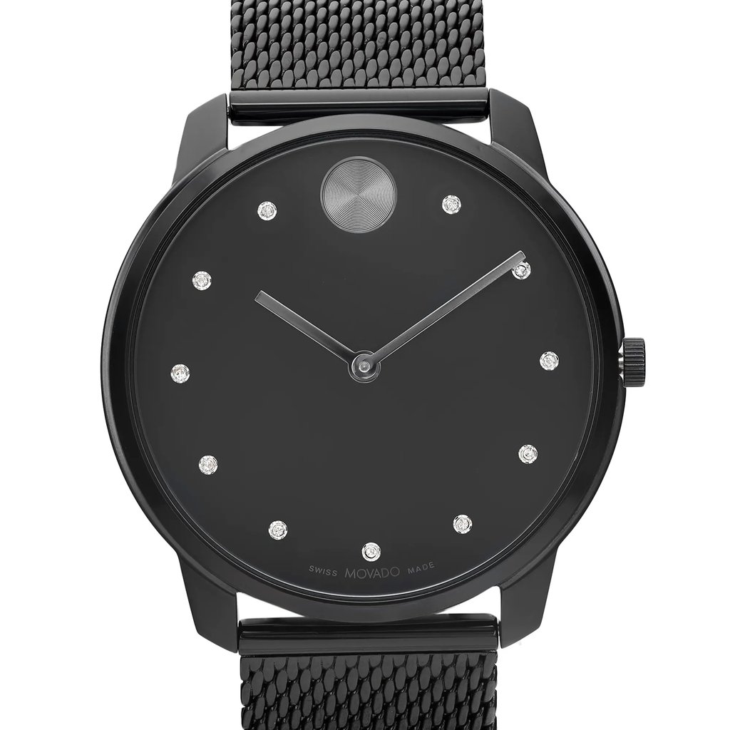 An image of a Wristwatch by Movado. This New With Defects item is designed for Men, featuring a Casual style. It has a Quartz movement and an Analog display with a Black dial color. The indices include 12-Hour Dial. The band is made of Stainless Steel and the case is made of Stainless Steel. The watch has a Round shape with a case size of 42 mm and a case thickness of 8 mm.